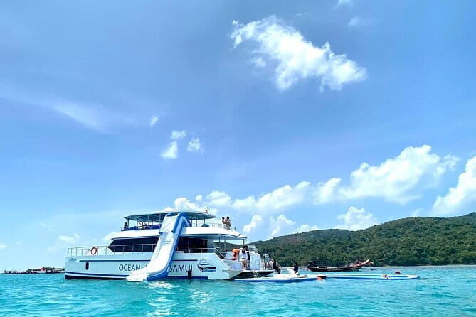 Koh Tan and Pig Island Half-Day Tour by Speed Catamaran - Koh Tan snorkeling and sea play: slide, kayak, paddleboard, repeat