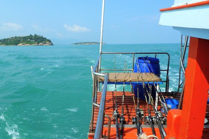 Mr. Tu Fishing Day Trip by Escort Boat from Koh Samui - The Thai Buffet Lunch: Food, Water, and Shade From the Sun
